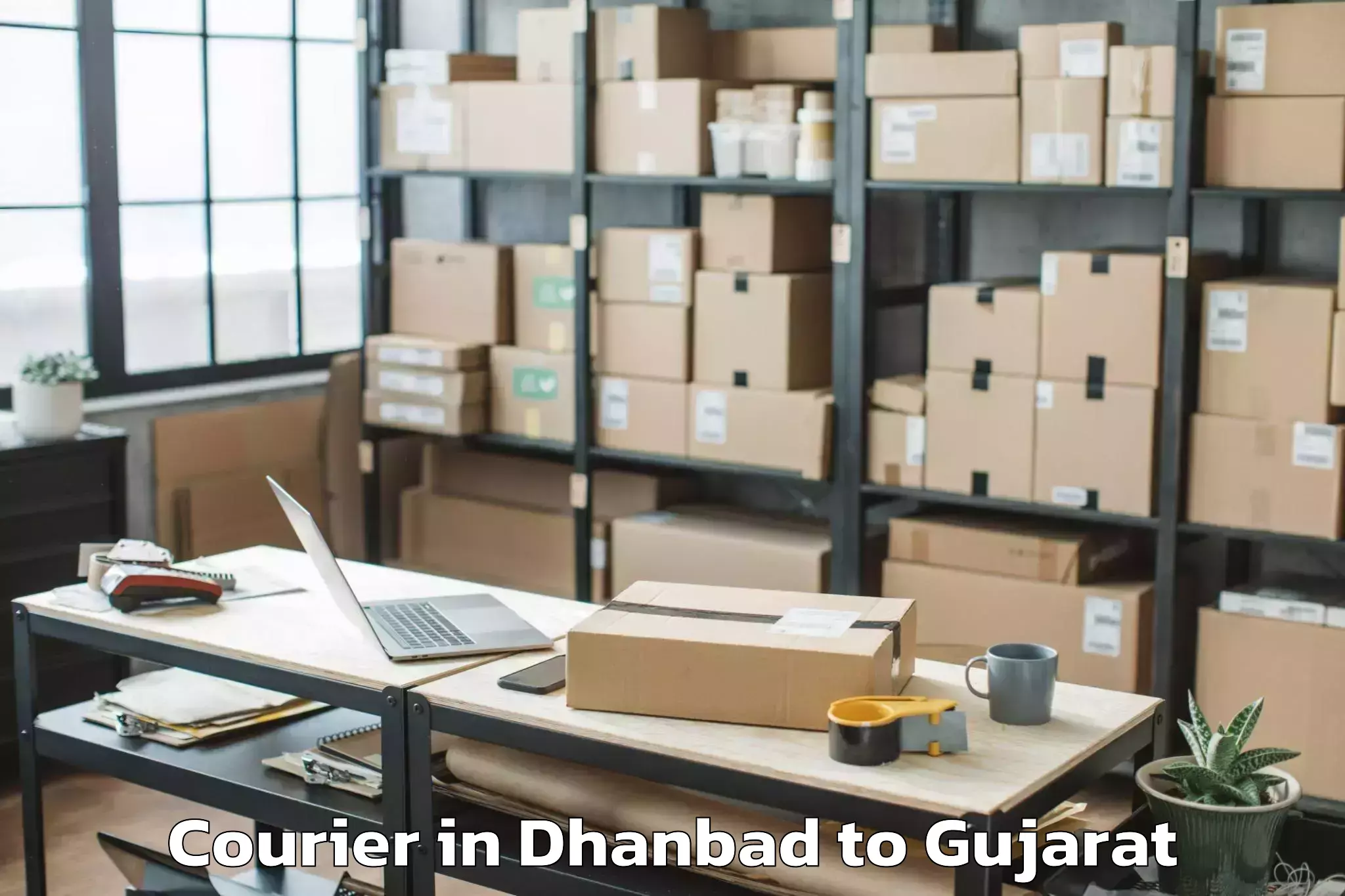 Reliable Dhanbad to Visavadar Courier